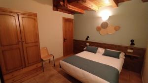 Postel nebo postele na pokoji v ubytování Apartaments Beta