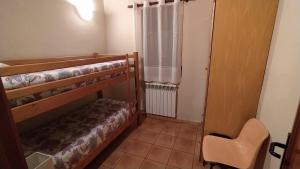 Postel nebo postele na pokoji v ubytování Apartaments Beta