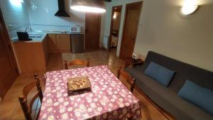 Kuchyň nebo kuchyňský kout v ubytování Apartaments Beta