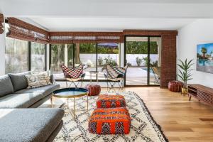 a living room with a couch and a table at The Kasbah in Palm Springs
