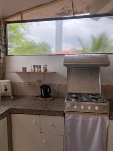 Una cocina o zona de cocina en Malevo Suites - Apartments