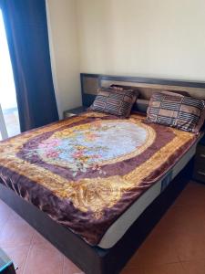 Ein Bett oder Betten in einem Zimmer der Unterkunft Golden Rent Porto Sharm