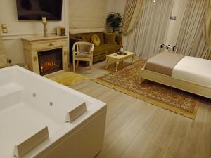A bed or beds in a room at Vip Lepanto Castle Suites