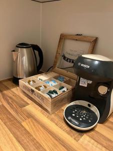 Kaffemaskin og/eller vannkoker på BRAN: Design - Apartment Küche, Parken ,Netflix