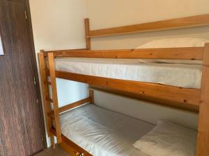 Postel nebo postele na pokoji v ubytování Quiberon
