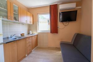 Cucina o angolo cottura di Apartmani Malbašić