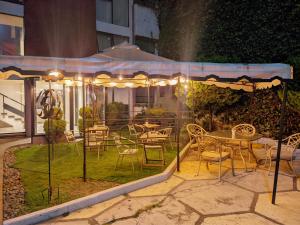 Un jardín fuera de Hotel Plaza Morelos 10 fotos más