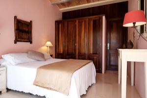 Posteľ alebo postele v izbe v ubytovaní Country Homes, Suites & Villas by Can LLuc