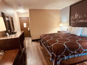 Voodi või voodid majutusasutuse FairBridge Inn Express Nyack toas