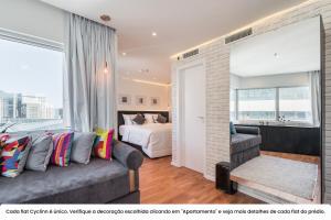 RD Cyclinn Vila Olímpia客房内的一张或多张床位