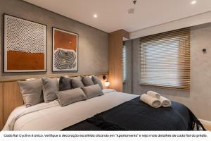 RD Cyclinn Vila Olímpia客房内的一张或多张床位