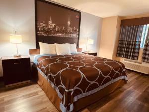 Voodi või voodid majutusasutuse FairBridge Inn Express Nyack toas