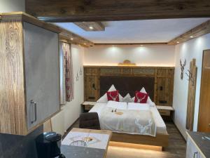 Ένα ή περισσότερα κρεβάτια σε δωμάτιο στο Haus Romantika
