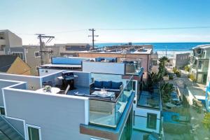 a house with a view of the ocean at Luxury Ocean Oasis 3BR I Balcony I Firepit in San Diego
