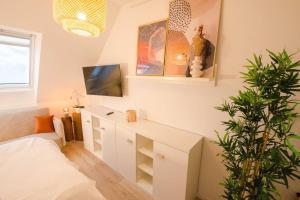 Foto dalla galleria di CASARINA - Gemütliches Apartment im Zentrum a Augusta (Augsburg)