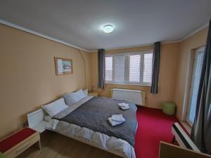 Ένα ή περισσότερα κρεβάτια σε δωμάτιο στο Bed and Breakfast Majesty