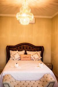 Een bed of bedden in een kamer bij Sítio Estância Beija flor