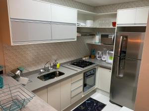 Kuchyň nebo kuchyňský kout v ubytování Luxo Capivari - Gaudi Loft Design + 8 fotografií