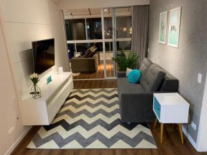 TV a/nebo společenská místnost v ubytování Luxo Capivari - Gaudi Loft Design