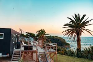 a beach house with a view of the ocean at オーシャンリゾート ザ クリフ in Shimoda