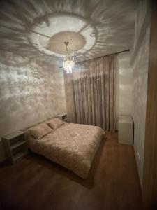 מיטה או מיטות בחדר ב-Appartement sublime piscine Marrakech