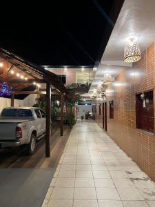 a car parked in a garage at night at POUSADA ECOALTER in Santarém