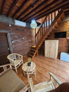 Posezení v ubytování Jineng Guest house by the swand