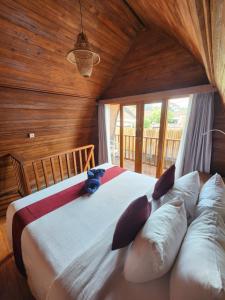 Postel nebo postele na pokoji v ubytování Jineng Guest house by the swand