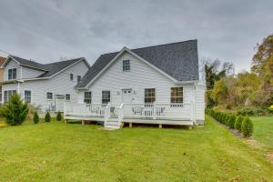 a large white house with a large yard at Airy West Cape May Cottage Less Than 1 Mi to Beach! in Cape May