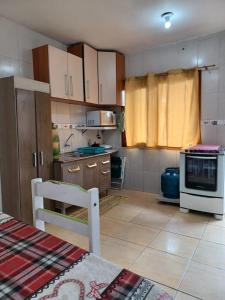 Кухня или кухненски бокс в Apartamento em Imbé Aceita Pets