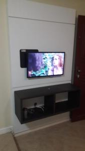 En tv och/eller ett underhållningssystem på sobrado ferreira