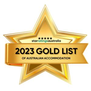 a gold star with the words gold list of australian accommodation at The Retreat at Froog Moore Park in Tamworth
