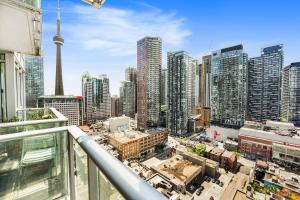 an apartment balcony with a view of a city at King Bed, Amazing View, Free Parking in Toronto