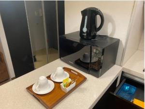 Haeundae Wide Ocean View & Residence的咖啡和沏茶工具