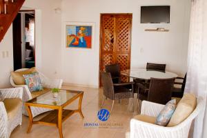 TV a/nebo společenská místnost v ubytování Apartamentos Magallanes Bayahibe