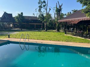Bazén v ubytování Chiang Mai Slow time nebo v jeho okolí