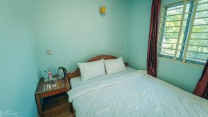 Postel nebo postele na pokoji v ubytování Koh Rong 71 Guesthouse