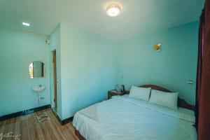 Postel nebo postele na pokoji v ubytování Koh Rong 71 Guesthouse