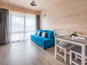 Posezení v ubytování Cozy, wooden holiday homes with terraces + 22 fotografií