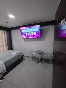 Et tv og/eller underholdning på Hostal El Edén Huaral