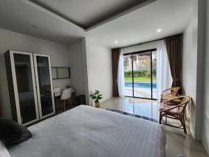 Giường trong phòng chung tại PoolVilla 234 Patong +48 ảnh