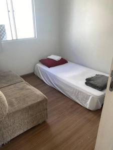 Giường trong phòng chung tại Errado