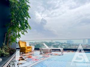 a view of a swimming pool on top of a building at Arte Cheras Romantic MRT Cheras Wi-Fi Smart Tv AsHome in Kuala Lumpur