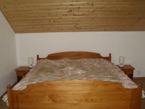Ένα ή περισσότερα κρεβάτια σε δωμάτιο στο Apartmány nad Otavou