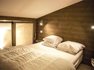 Łóżko lub łóżka w pokoju w obiekcie Appartement Tignes, 3 pièces, 4 personnes - FR-1-480-25
