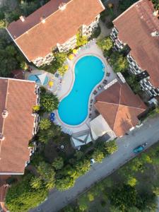 Bazén v ubytování LEMAS SUITE HOTEL nebo v jeho okolí
