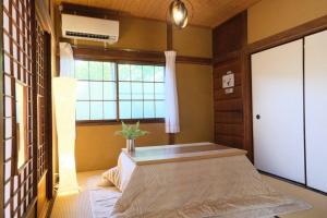 Postel nebo postele na pokoji v ubytování 12月NEWOPEN 鎌倉House 響 ペットと泊まれる北鎌倉4LDK貸別荘