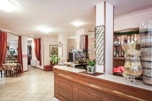 Nápoje v ubytování Hotel Fabbrini