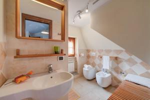 a bathroom with a sink and a toilet at Studio Placide Mountain View - Happy Rentals in Sauze dʼOulx