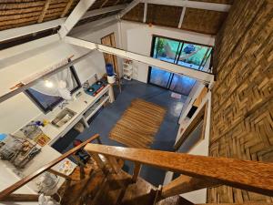 an overhead view of a kitchen in a tiny house at The Surf House Pacifico in San Isidro